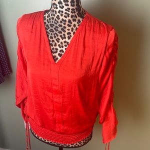 Philosophy, medium orange top